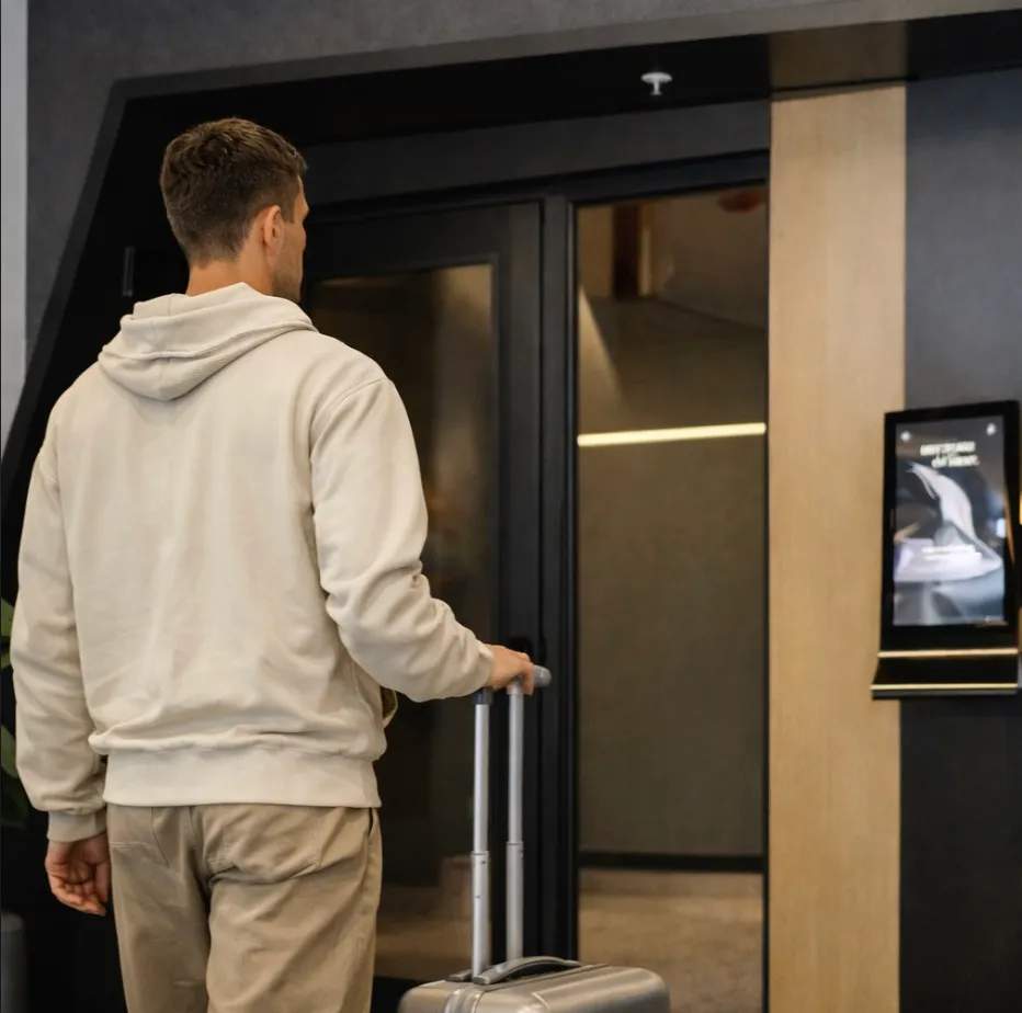 Traveler entering a Wait N' Rest room